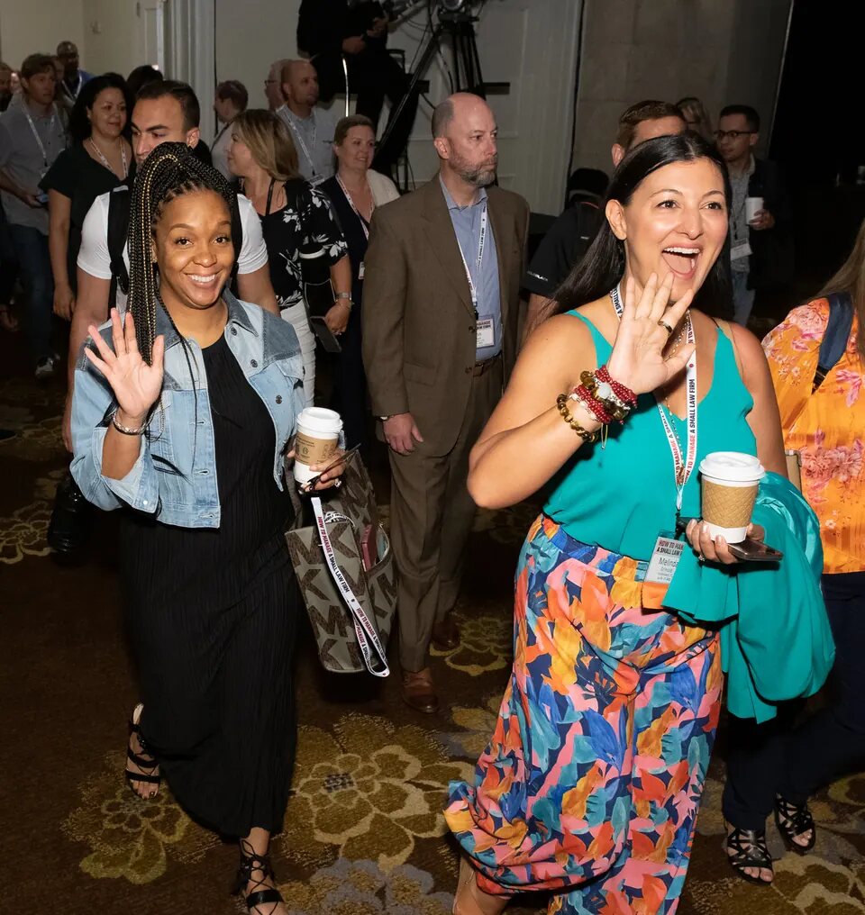 HTM members arriving at a live event