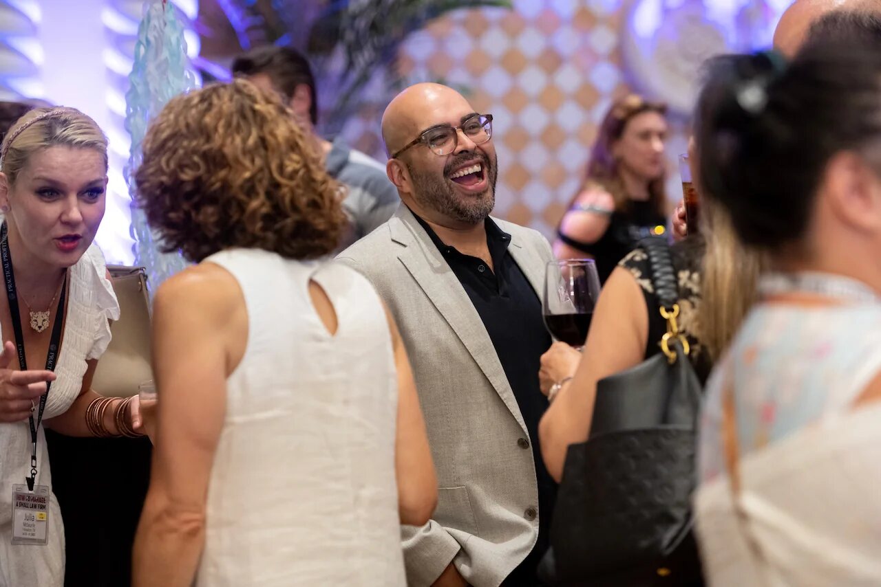 Law firm owners gathered at an HTM community event