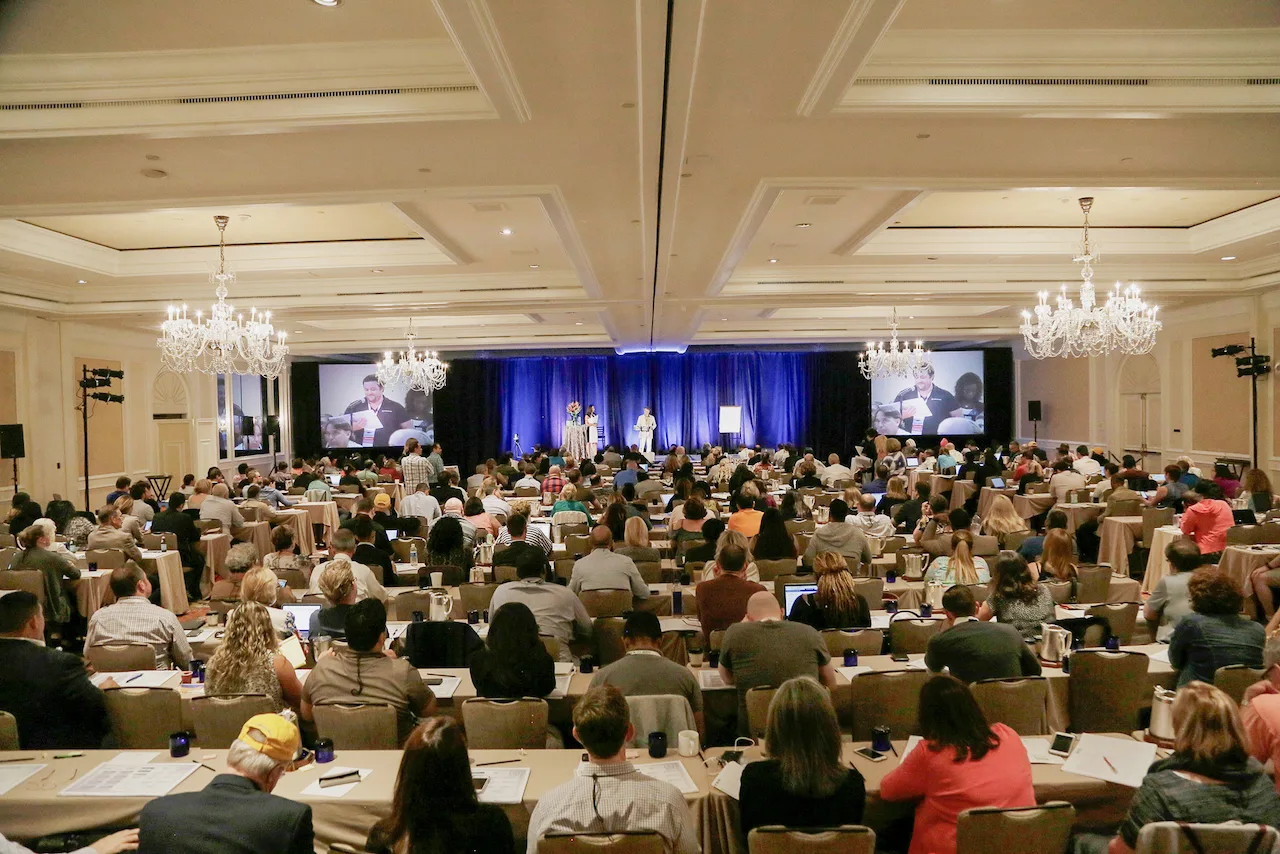 Law firm owners gathered for an HTM presentation in a full ballroom.