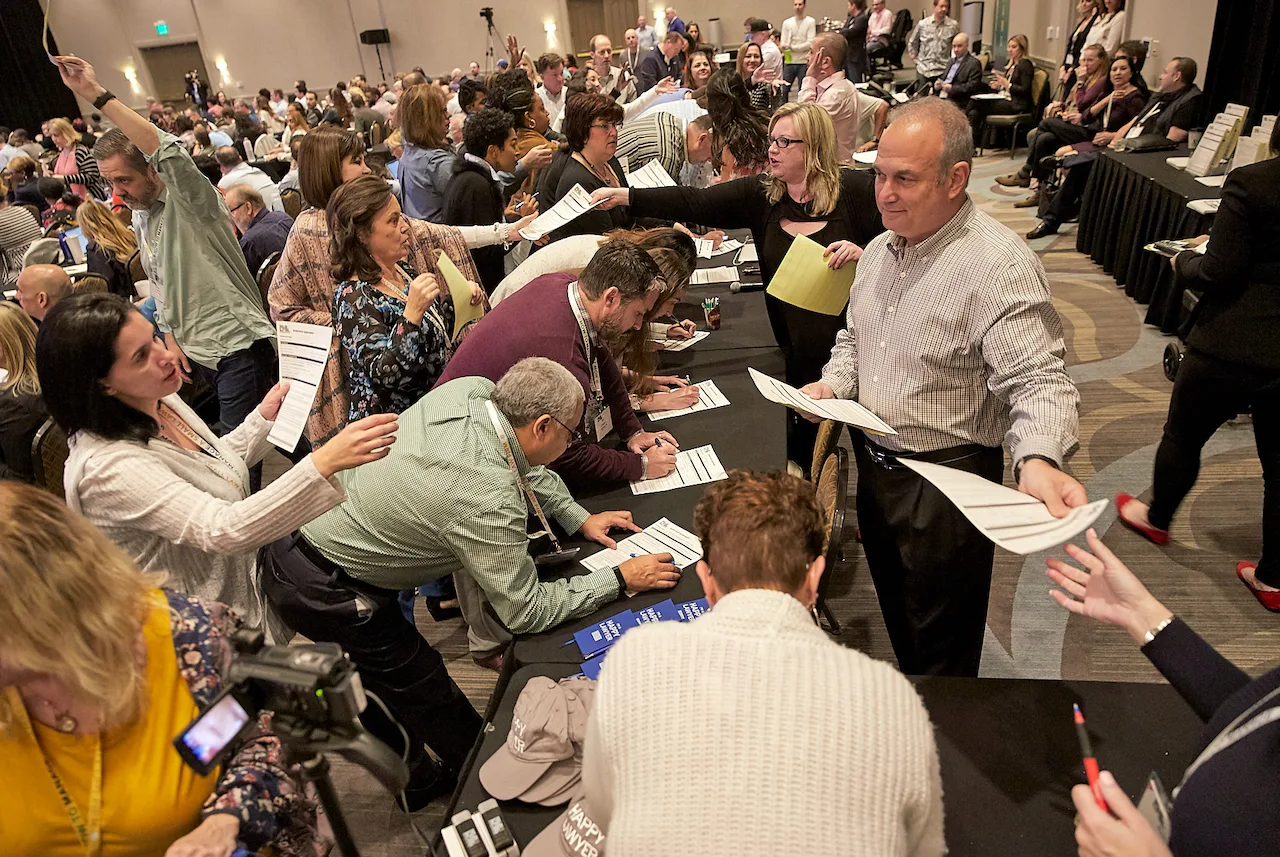 Law firm owners actively working together during an HTM live workshop.